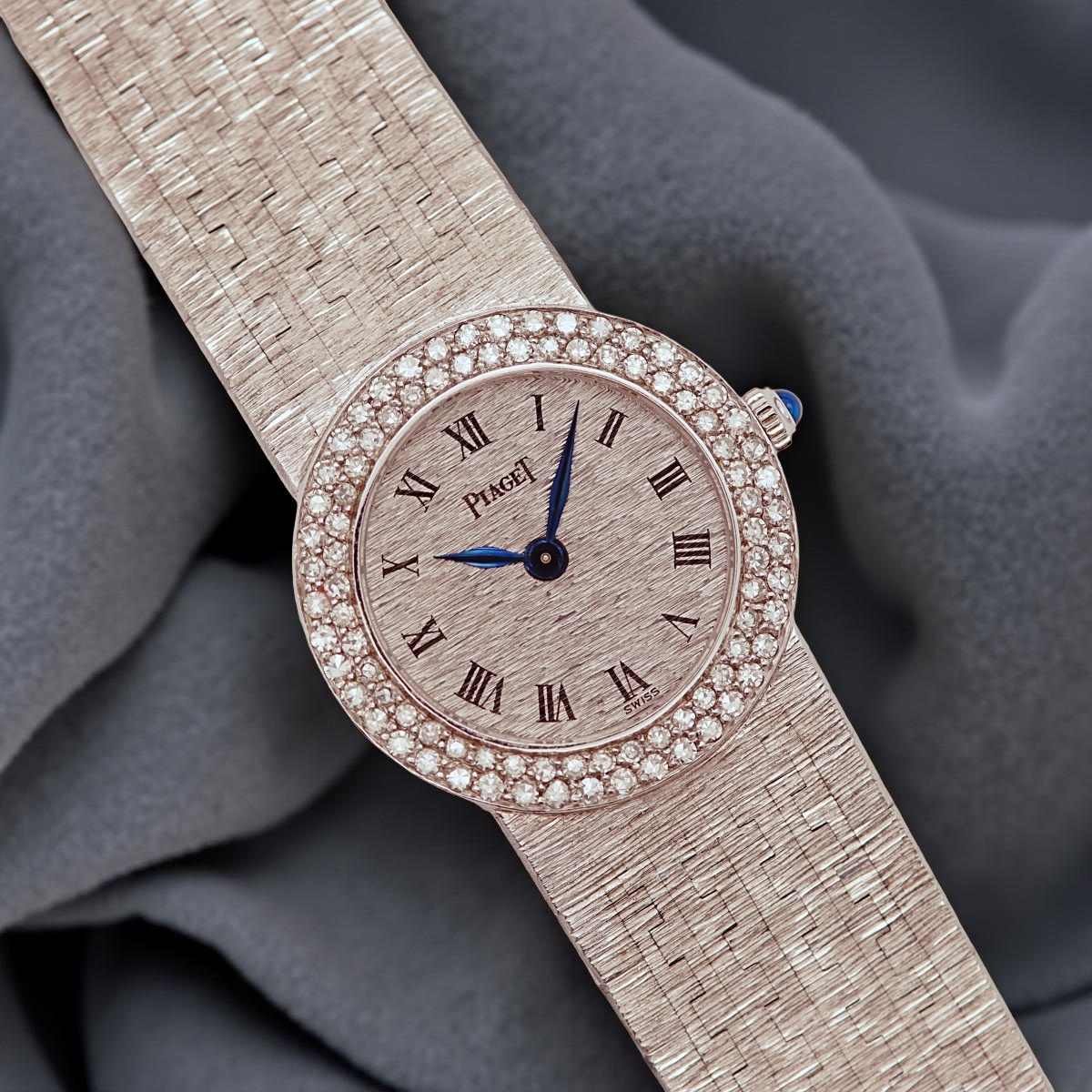 Martino Sassella - Piaget White gold women's watch with diamond bezel